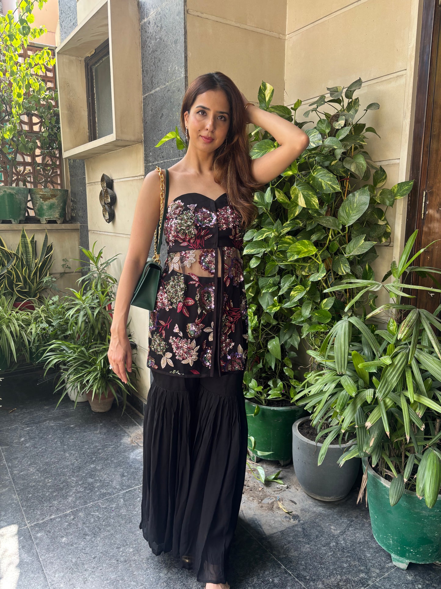 Black gharara with embroidered blouse